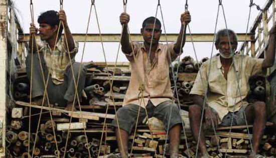 migrant workers from Bihar in a truck in Mumbai