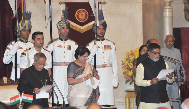 President  Pranab Mukherjee administering the oath as Minister of State to Ram Kripal Yadav, at a Swearing-in Ceremony, at Rashtrapati Bhavan, in New Delhi on November 09, 2014.