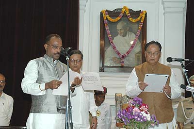 Governor R.S. Gavai administering the oath of office to Nagmani